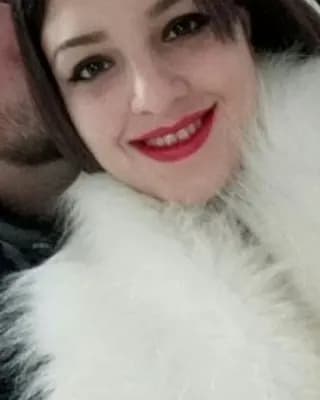 Милица У